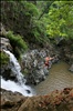 Jumping a tropical waterfall